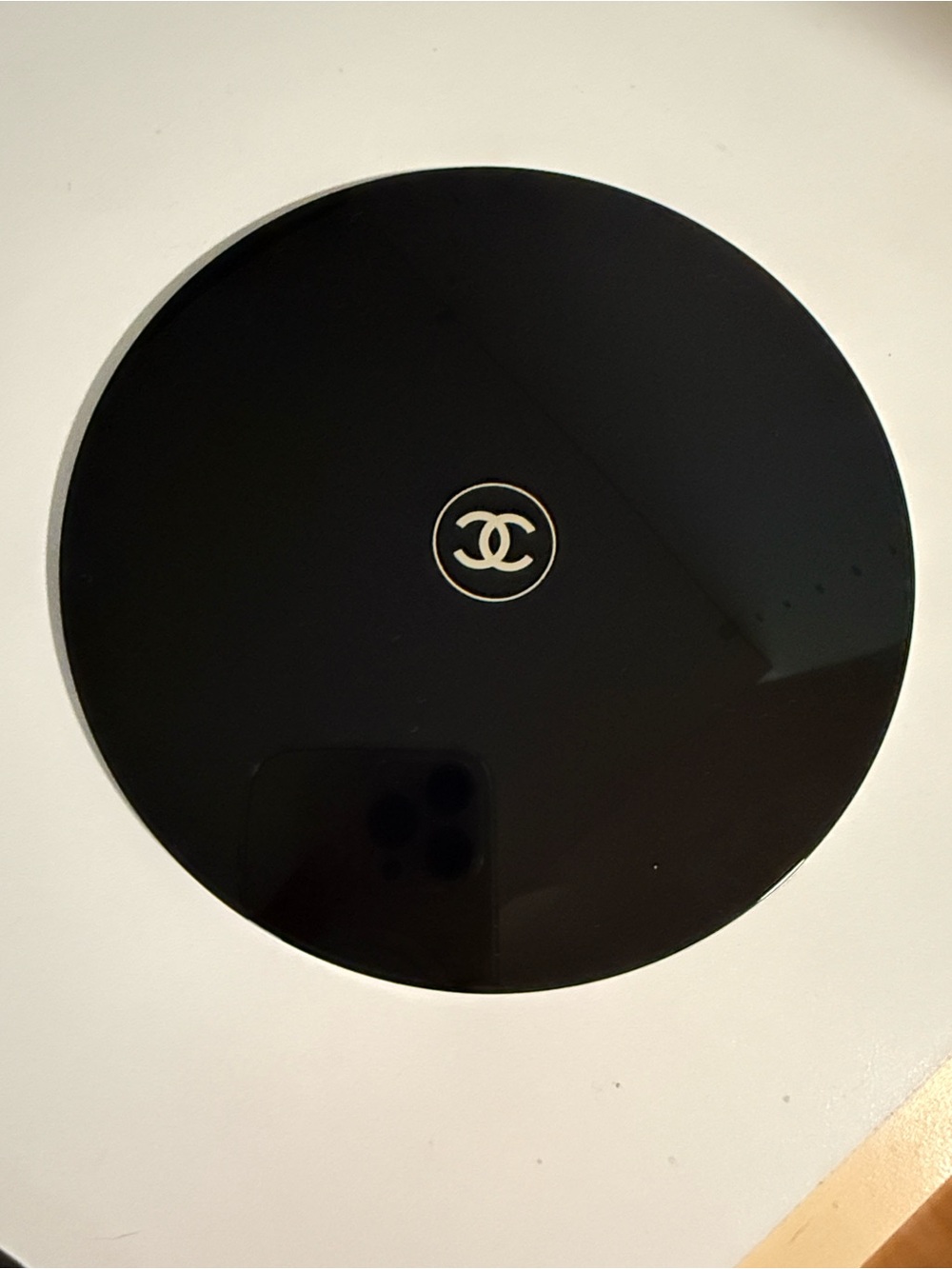 CHANEL Glossy Black Round Mirror with CC Emblem.  Magnified Mirror.